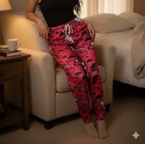 Stylish Black Tank Top and Red Graphic Joggers